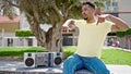 African american man smiling confident dancing at park Royalty Free Stock Photo