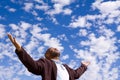 African American man stading outside with open arms. Royalty Free Stock Photo