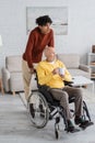 African american man standing near granddad