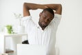 African american man stretching doing office exercises at sedent Royalty Free Stock Photo
