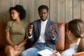 African-american man talking to family counselor, black couple a Royalty Free Stock Photo