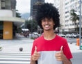 African american man with typical afro hair showing both thumbs Royalty Free Stock Photo