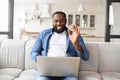 African-American man usinf laptop for video call at home Royalty Free Stock Photo