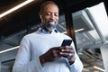 African American man using his phone Royalty Free Stock Photo