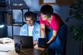 African american man and woman business workers using laptop and touchpad working at office Royalty Free Stock Photo