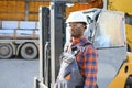 African American Man at work. Professional operation engineering. Young worker forklift driver Royalty Free Stock Photo
