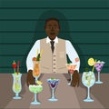 An African-American man works as a bartender.