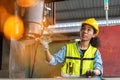 african american Mechanical engineer woman working with monitor controller in metal Heavy factory industries . black worker female Royalty Free Stock Photo