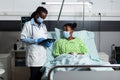 African american medic checking disease treatment