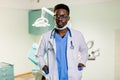 African American Medical physician doctor man over hospital background. Royalty Free Stock Photo