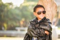 African American Mexican Boy Dressed Up in Sunglasses and Leather Jacket Royalty Free Stock Photo