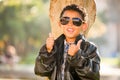 African American Mexican Boy Dressed Up in Sunglasses and Leather Jacket Royalty Free Stock Photo