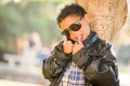 African American Mexican Boy Dressed Up in Sunglasses and Leather Jacket Royalty Free Stock Photo