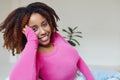 African american millennial girl, wearing pink, contented and calm