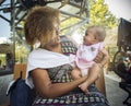 African american mother holds her baby Royalty Free Stock Photo