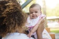 African american mother holds her baby Royalty Free Stock Photo