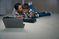 African american mother hugging and kissing her teenage son Royalty Free Stock Photo