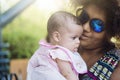 African american mother kisses baby Royalty Free Stock Photo