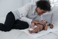 African american mother spend time with her baby boy at home Royalty Free Stock Photo