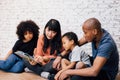 African American parents reading a fairy tale fable story