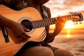 African american person\'s hands playing acoustic guitar on sandy beach at sunset time. Playing music concept, neural network