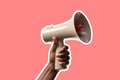 African american persons hand holding an announcement megaphone. Graphic cut out style