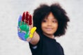 African American playful and creative kid getting hands dirty wi Royalty Free Stock Photo