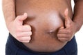 African American Pregnant Couple thumbs up near black belly on white background Royalty Free Stock Photo