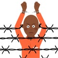 African american prisoner in broken handcuffs stands over barbed wire