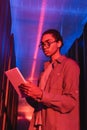 african american programmer looking at digital
