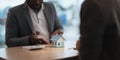 African american real estate agent showing house to his clients after contract signing, concept for real estate, moving Royalty Free Stock Photo