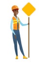 African-american road worker showing road sign.