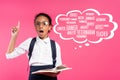 African american schoolgirl with book showing