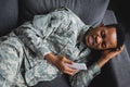 African american soldier crying while holding Royalty Free Stock Photo