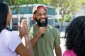 African american street musician singing outdoor in the city