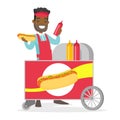 African-american street seller making a hot dog. Royalty Free Stock Photo