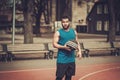 African-american streetball player practicing outdoors