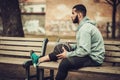 African-american streetball player resting outdoors