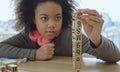 African American student doing activity playing block wooden for development together with enjoy and fun in the classroom Royalty Free Stock Photo