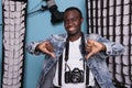 African american studio producer showing thumbs down hands symbol