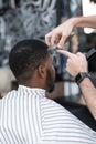 African American in a stylish barbershop