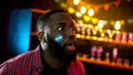 African american supporter with argentinian flag on cheek shocked with results Royalty Free Stock Photo