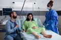 Surgeon discussing with pregnant woman Royalty Free Stock Photo