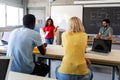 African American teen female high school student giving oral class presentation in front of multiracial classmates. Royalty Free Stock Photo
