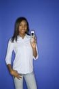 African-American teen girl holding cellphone. Royalty Free Stock Photo