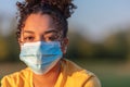African American Teenager Girl Woman Wearing Coronavirus COVID-19 Face Mask