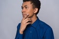 African American teenager reflects on something. Royalty Free Stock Photo