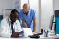 African american therapist doctor analyzing medicine documents