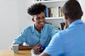 African american trainee and black businessman at job interview Royalty Free Stock Photo