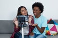 African american vlogger and influencer girl recording video blog Royalty Free Stock Photo